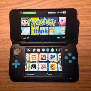 New Nintendo 2DS XL Console with Pokemon Bank, Poke Transporter & Games